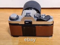 Brown Olympus OM20 SLR Vintage Camera with 70-210 Zoom Lens 35mm Retro Working